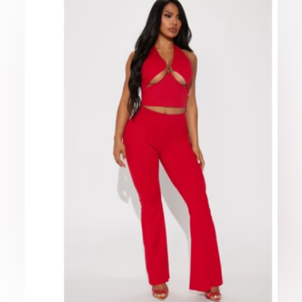 NWOT 2 pc red pant set. Top is a halter. Never worn.